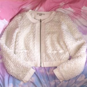 White furry jacket